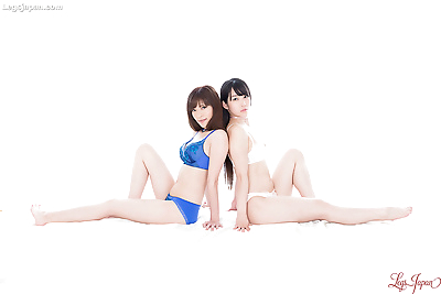 Two Japanese females release their pussies from their panties